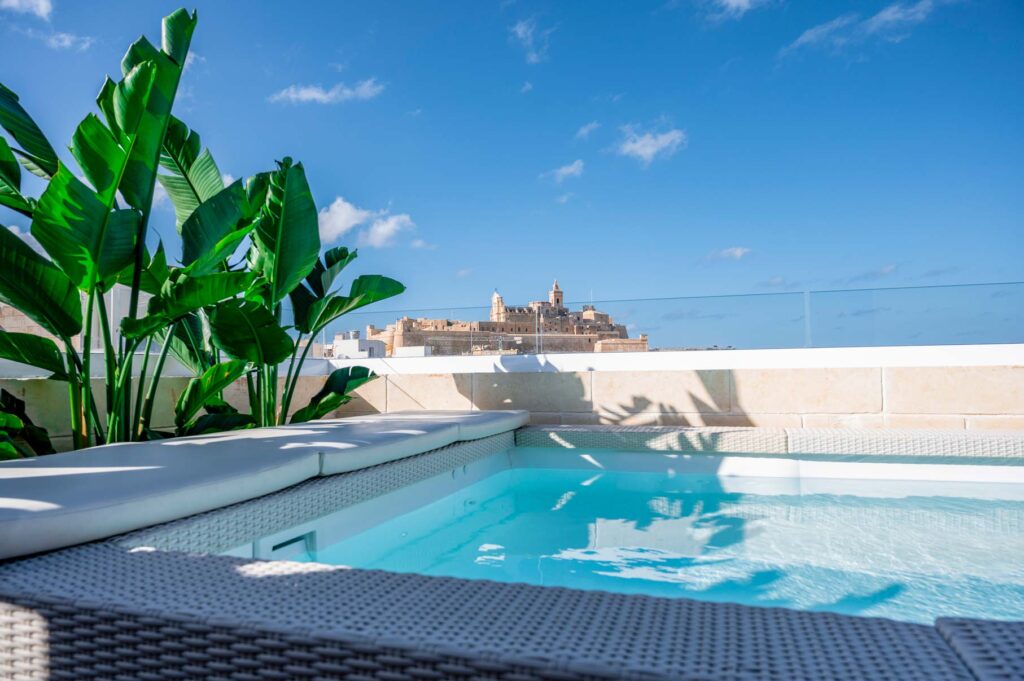 rooftop pool of gozo b&b boutique hotel with cittadella view