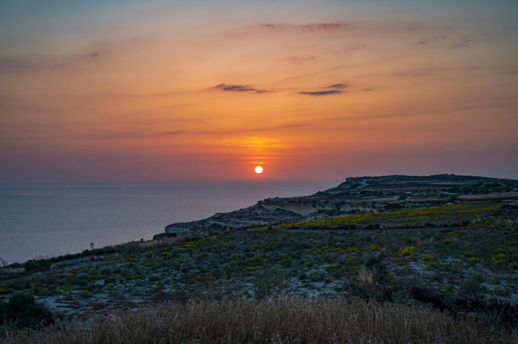 sunset in gozo island, malta